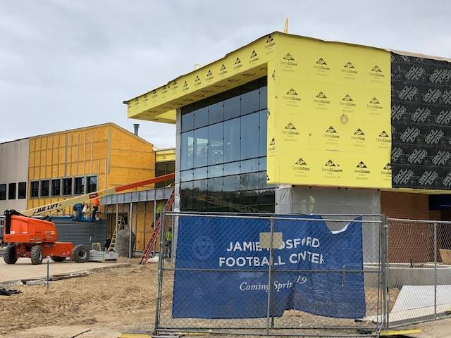 Further construction on the front of the Jamie Hosford Football Center.